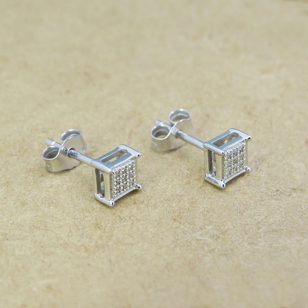 0.06 CT Round White Diamond Stud Earrings in Sterling Silver H73989